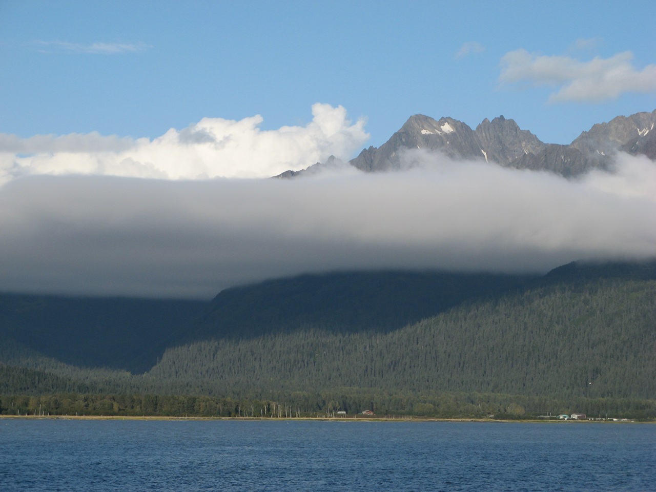 Seward, Alaska - Clouds hovering in mountain.